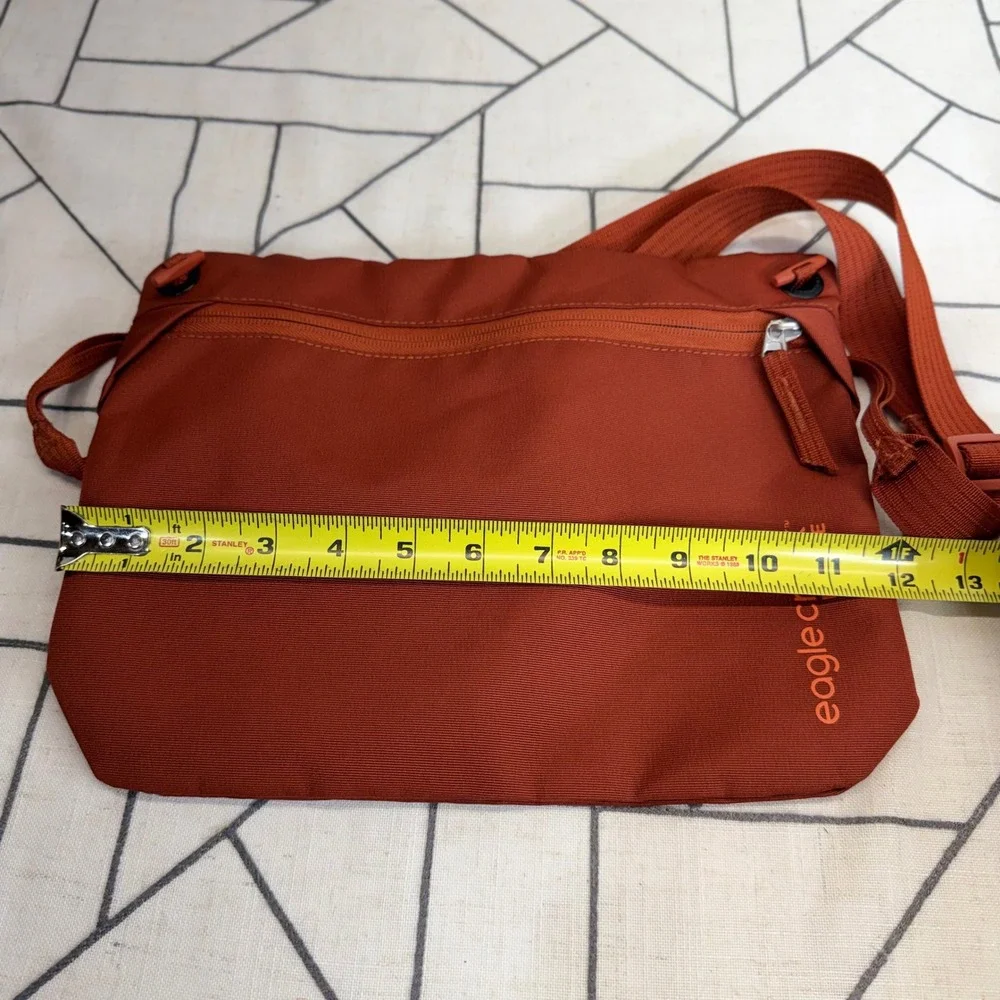 Eagle Creek Explore Sacoche Bag OS Rust Orange Crossbody Travel Pouch EC0A5LQ5